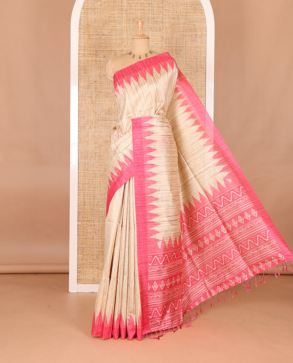 Chikku-pink plain Khicha katan silk saree, contrast pink temple border, ikkat printed pallu with tassels, and a contrast blouse