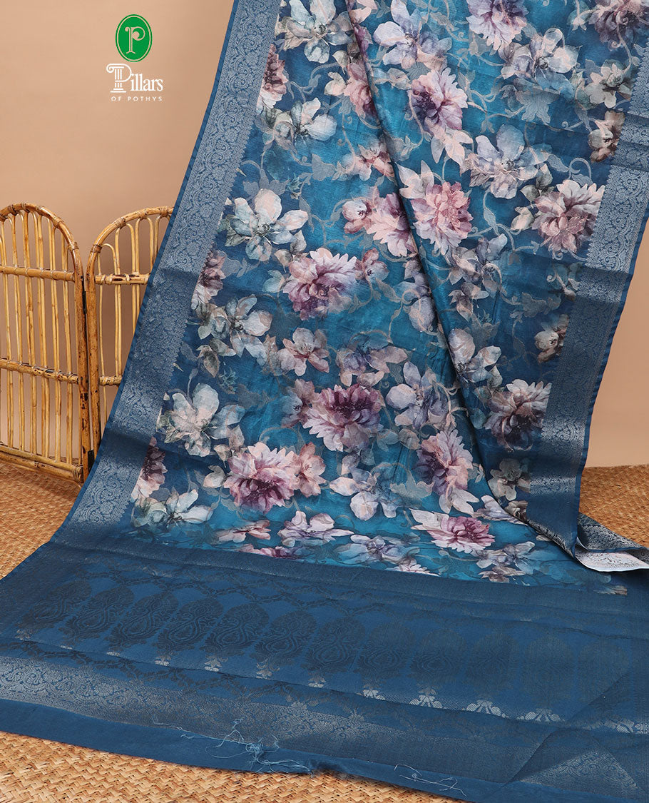 Peacock blue floral digital print semi-dupion saree with self zari weaving border