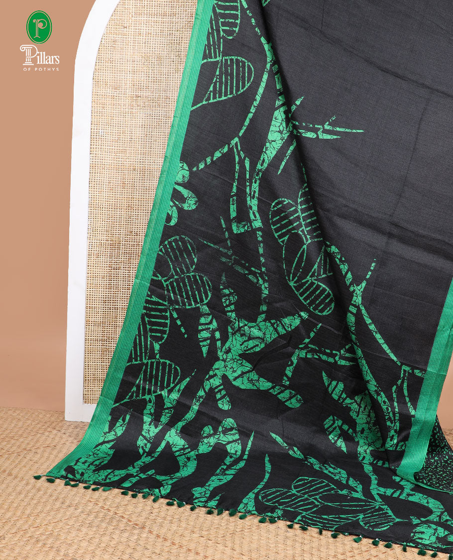 Black with green geomentrical design khadhi silk saree with contrast striped border & geomentrical print pallu along with printed blouse