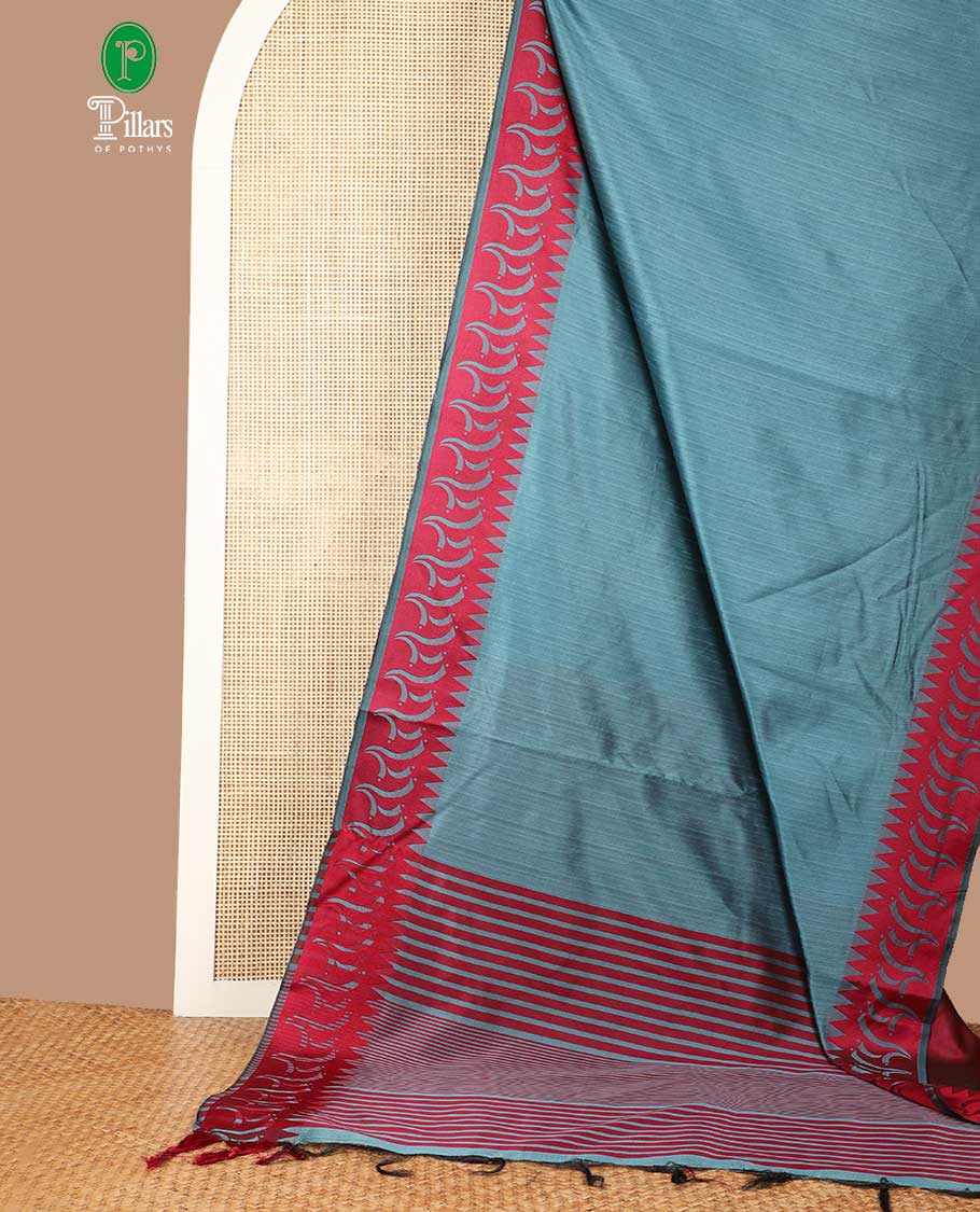 Blue plain banaras jute silk saree with satin temple border & chit pallu along with plain blouse