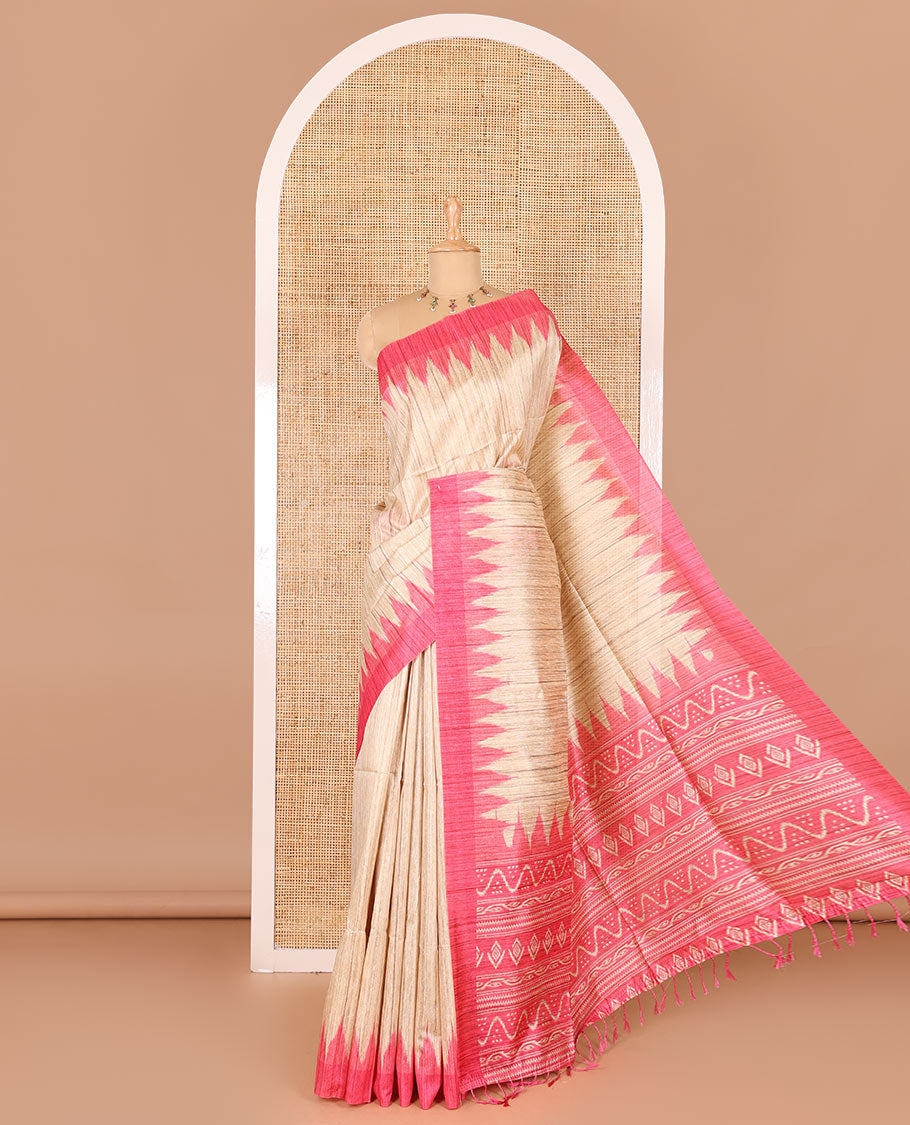 Chikku-pink plain Khicha katan silk saree, contrast pink temple border, ikkat printed pallu with tassels, and a contrast blouse