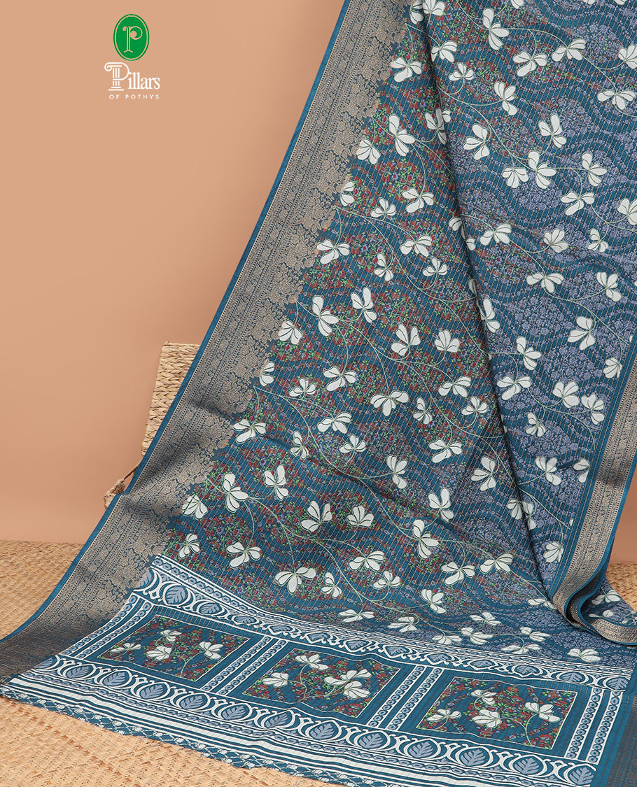 Blue allover foliage with zari line weaving dola silk saree with contrast zari jacquard border & printed rich pallu along with printed blouse