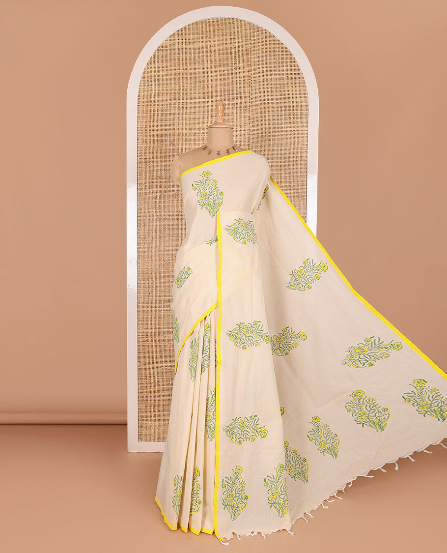 Borderless cream floral motifs printed South cotton saree with a matching blouse, and a contrast floral-paisley printed blouse