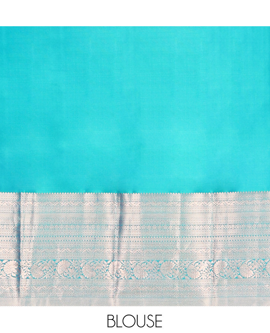 Blue Vasundhara Silk Saree, Accentuated with Zari Buttas on Its Body, Highlighted by a Zari Border of Rekku, Muthu, Diamond, and Kodi Visiry Designs, Grandly Woven Jaal Pallu, and Paired with a Matching Blouse