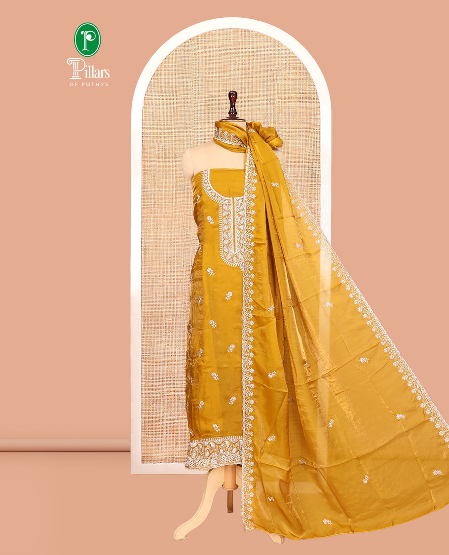 Mustard Fendi Organza Material Churidar Features Embroidered Top, a Santoon Bottom, a Scallop Embroidered Dupatta