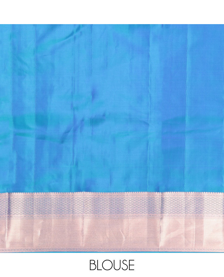 Blue Vasundhara Silk Saree, Delicately Woven with Jaal Jacquard Design All Over Its Body, Highlighted by a Zari Border of Thilakam Mokku, Jaal, and Lavangam Designs, Grand Jaal Pallu, and Paired with a Matching Blouse