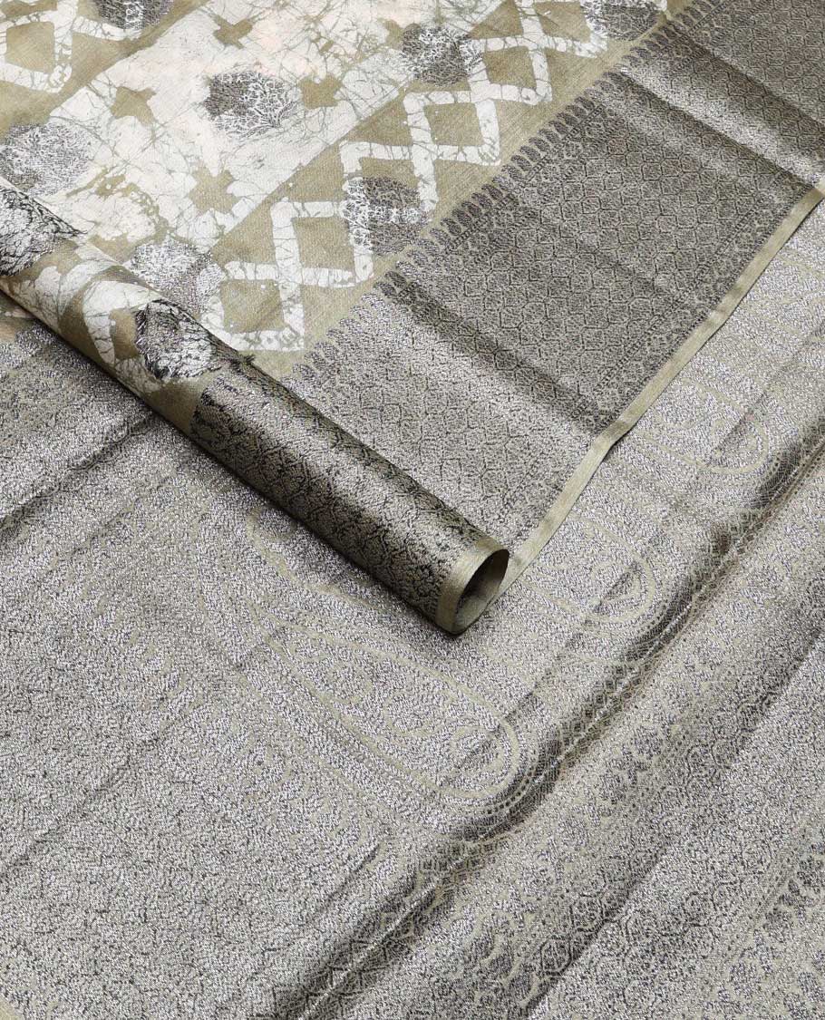 Beige tie and die style floral, geometric design tussar saree with contrast intricate zari design border & floral design pallu