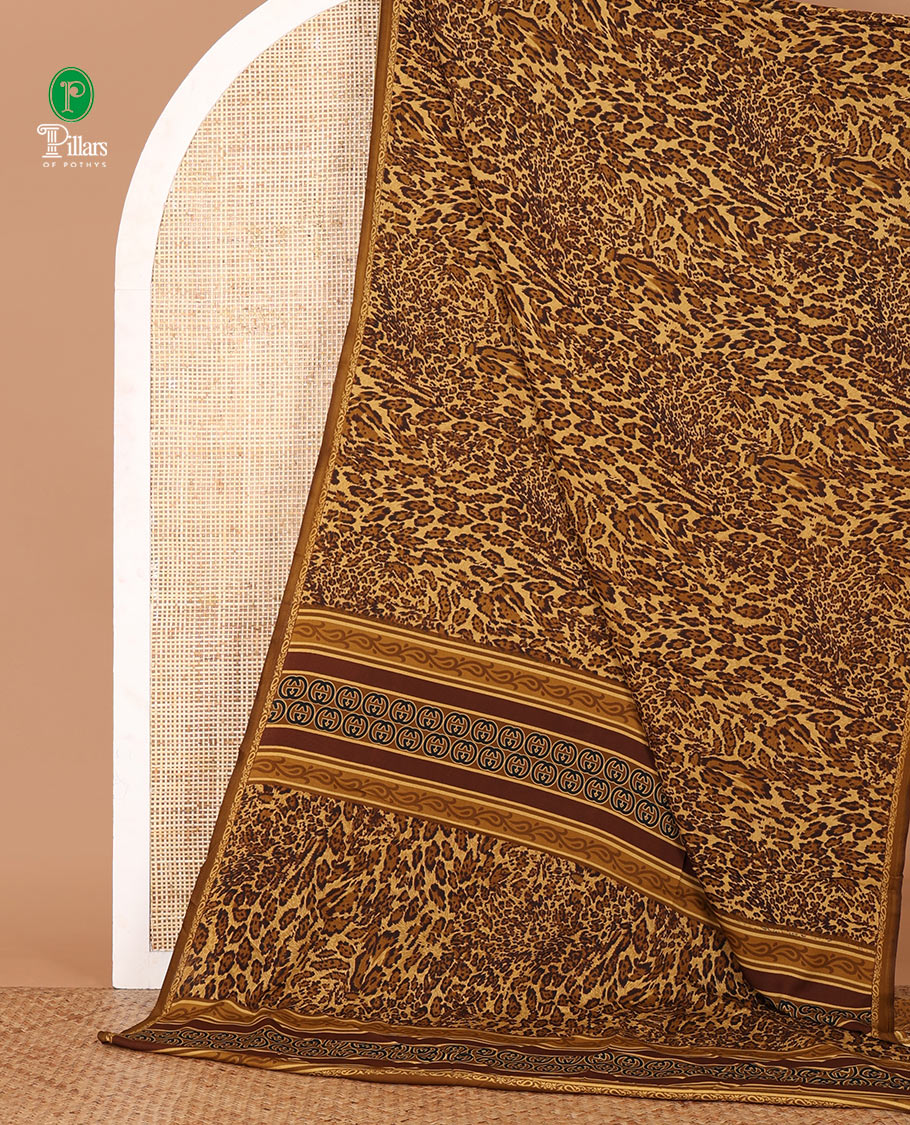 Khaki brown leopard-skin-like printed crepe silk saree, plain piping border, geometric motif printed pallu & animal-skin print blouse