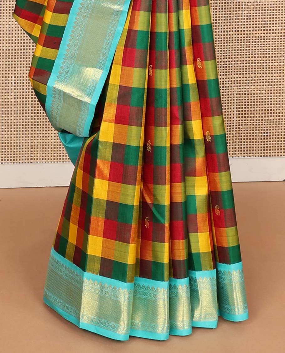 Multi-color paalum pazhamum checks, and buttas Kanchipuram korvai silk saree, contrast korvai border of thilakam mokku, muthu, and laddu kamalam, and annam chakram enclosed pallu