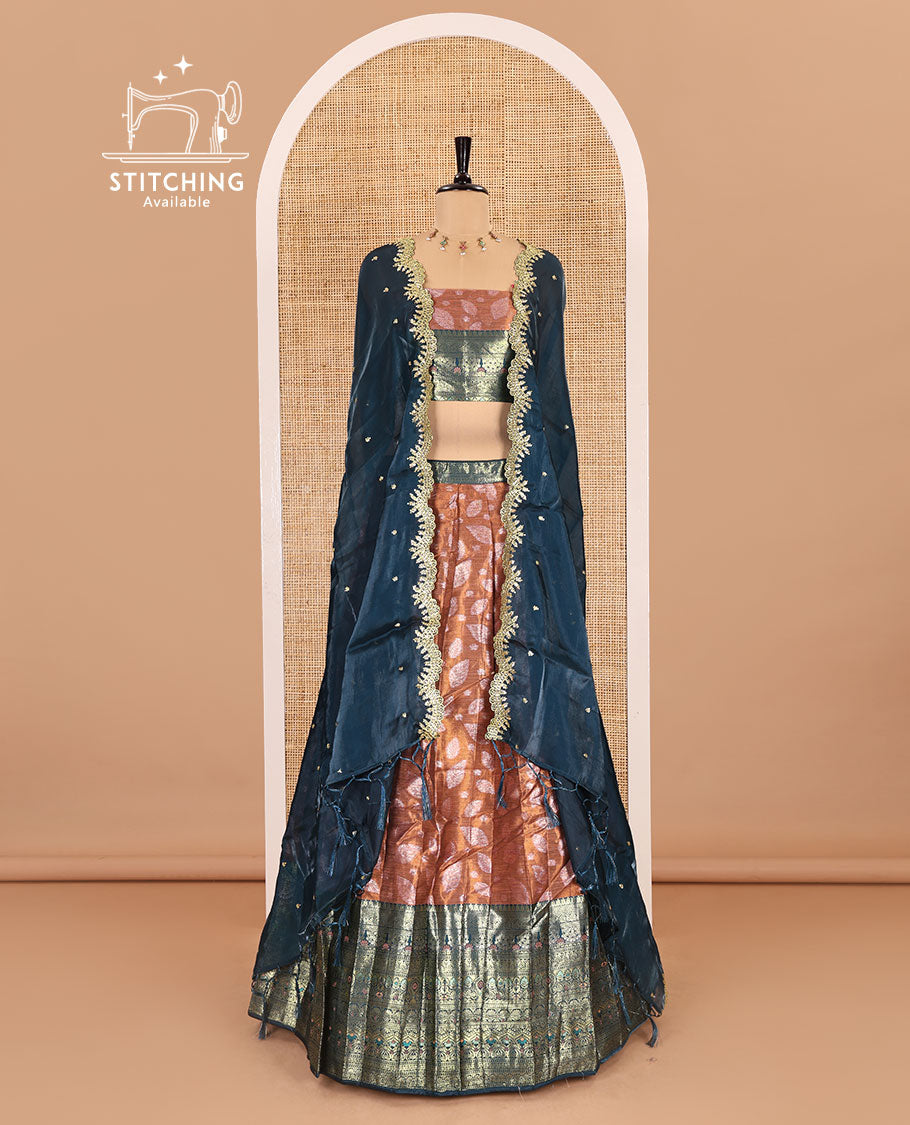Copper and peacock color half-saree, leaf jacquard with contrast traditional bordered banarasi tissue skirt, a matching blouse, and a contrast scallop embroidered fendi organza dhavani