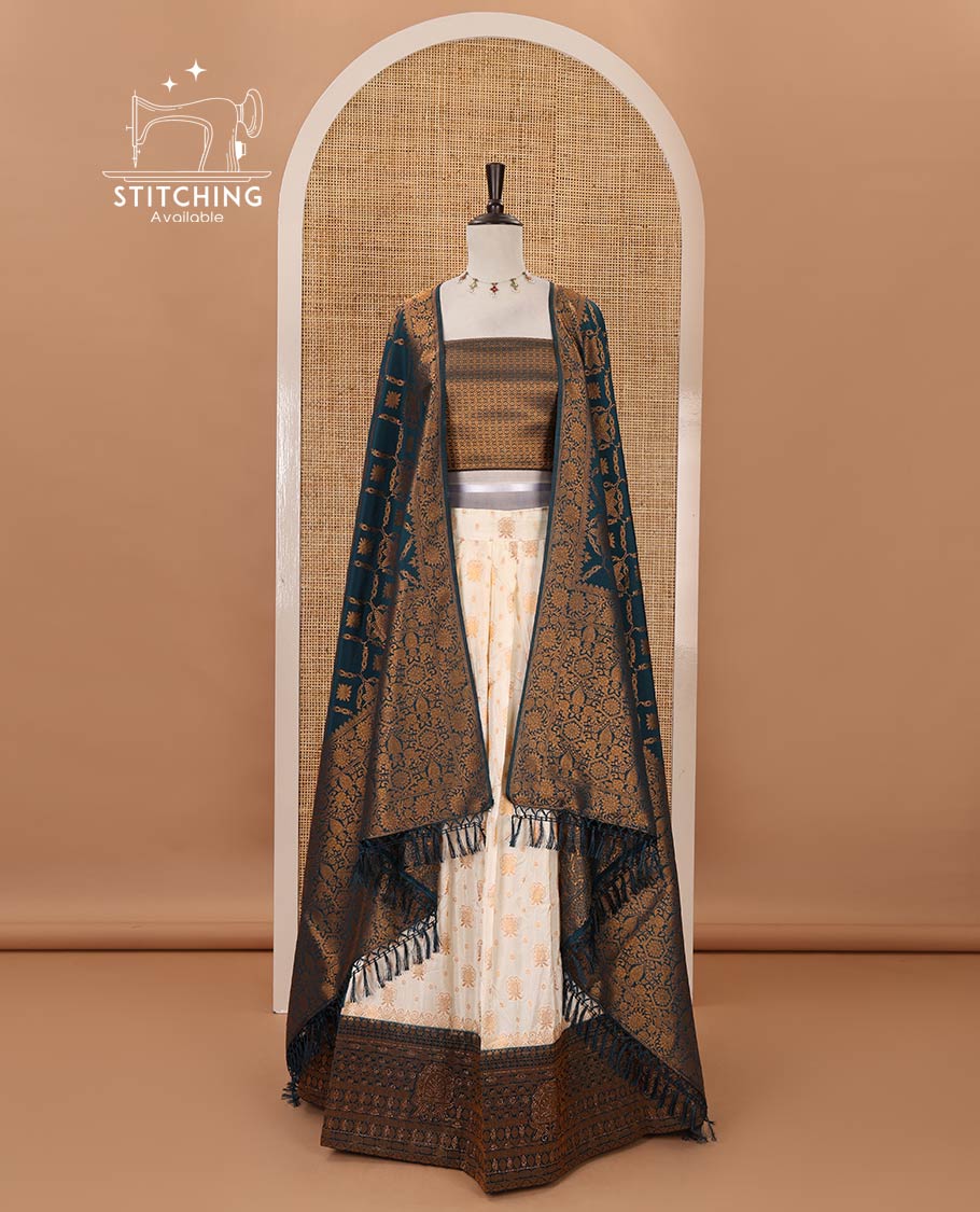 Cream semi-banaras half-saree, zari buttas & contrast Swarovski stonework traditional border skirt, jacquard blouse & contrast jaal jacquard peacock blue dhavani