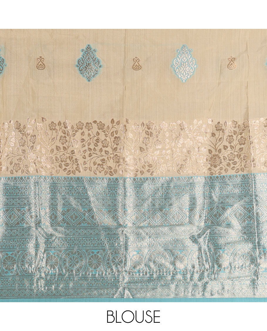 Cream taffeta silk half saree, meena buttas skirt, contrast blue traditional zari border, matching blouse, and zari woven dhavani