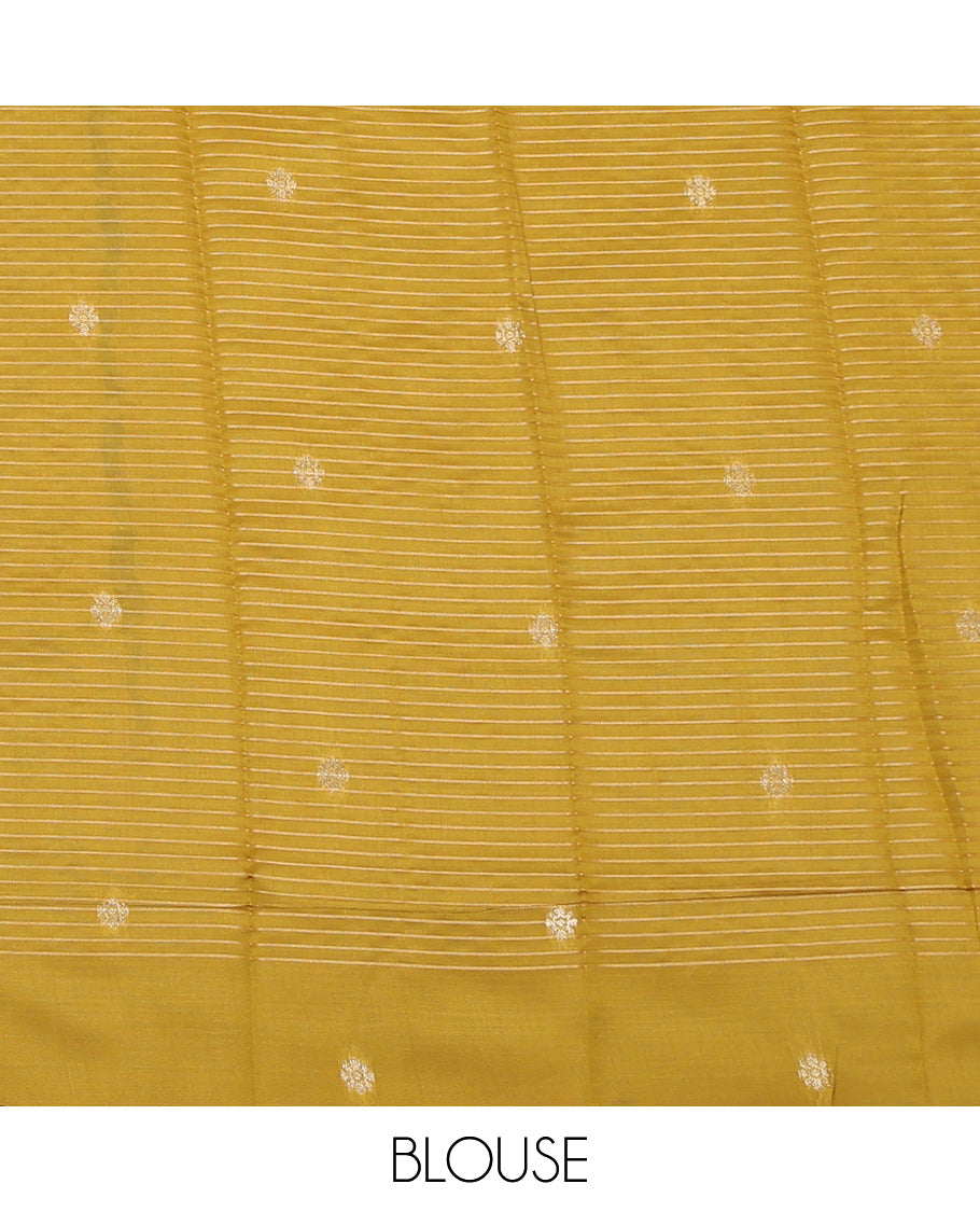 Green Litchi Saree, Gleamed Up with Peacock-Chakram Buttas and Checks, a Contrast Traditional Zari Border, Finely Crafted Pallu, and a Contrast Blouse