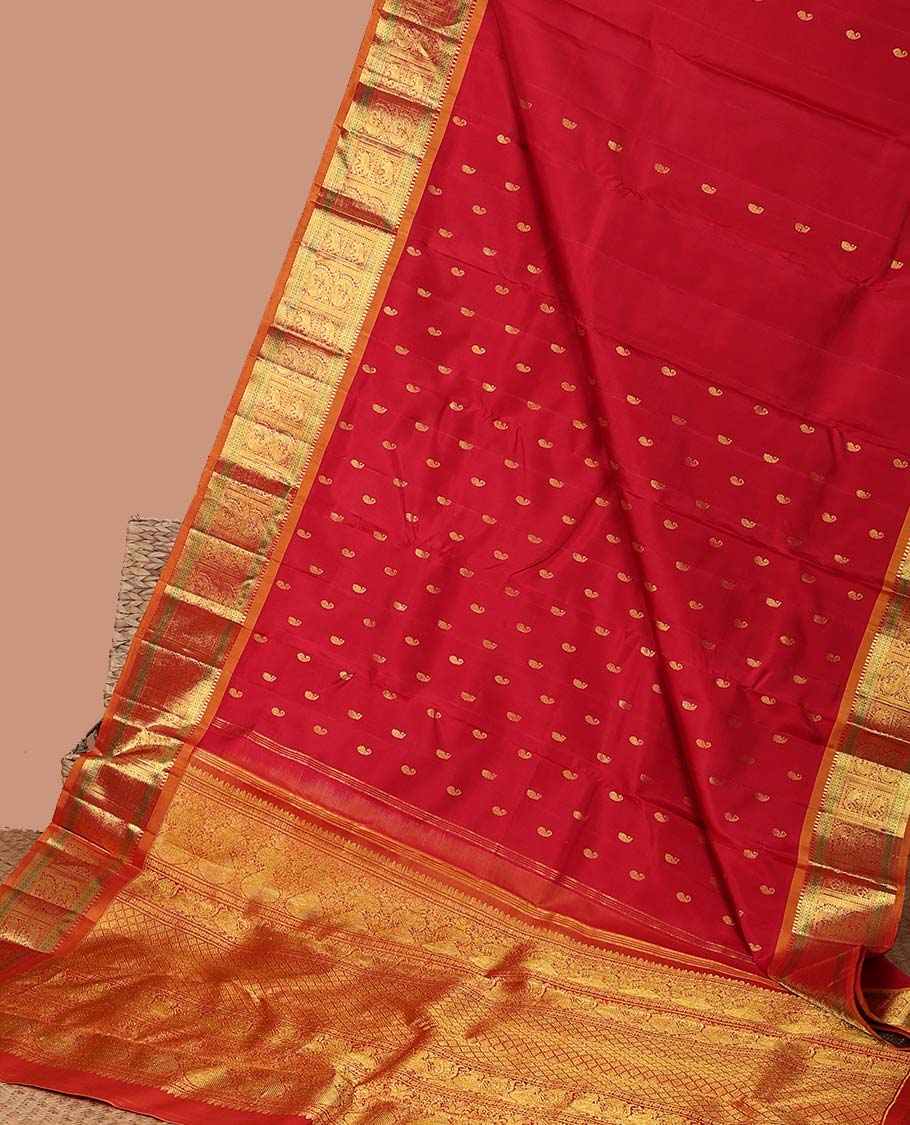 Red paisley buttas kanchipuram silk saree with contrast border of intricate zari design border & zari design pallu