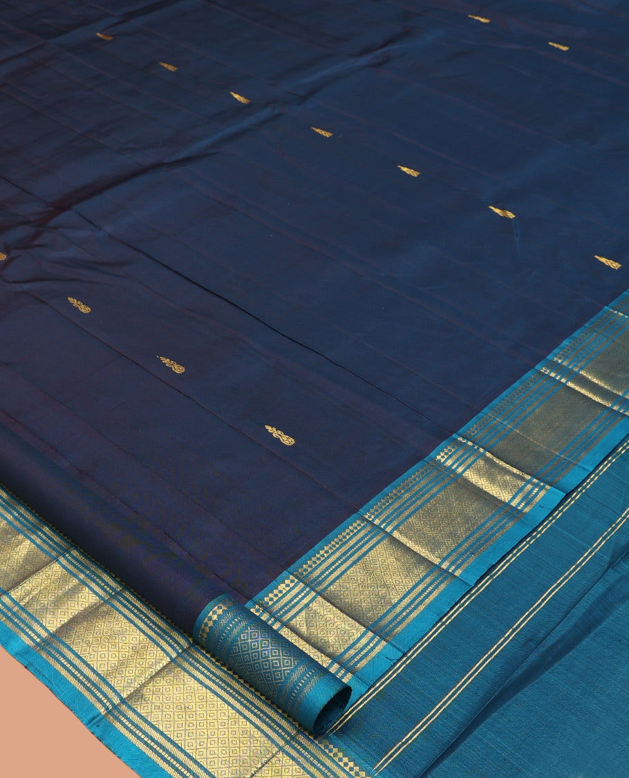 Blue Zari Buttas Kanchipuram Silk Saree, Complemented by a Contrast Border of Panner Sombu, Muthu, Banaras, and Mayil Kann Design, Pallu of Zari Design, and No Blouse