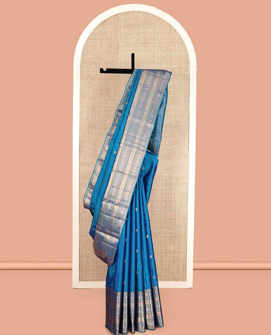 Blue Vasundhara Lite Silk Mix Saree Features Zari Buttas, a Zari Border of Kamalam, Ara Maadam, and Yaali, Pallu of Butta Enclosed Checks, and a Matching Blouse