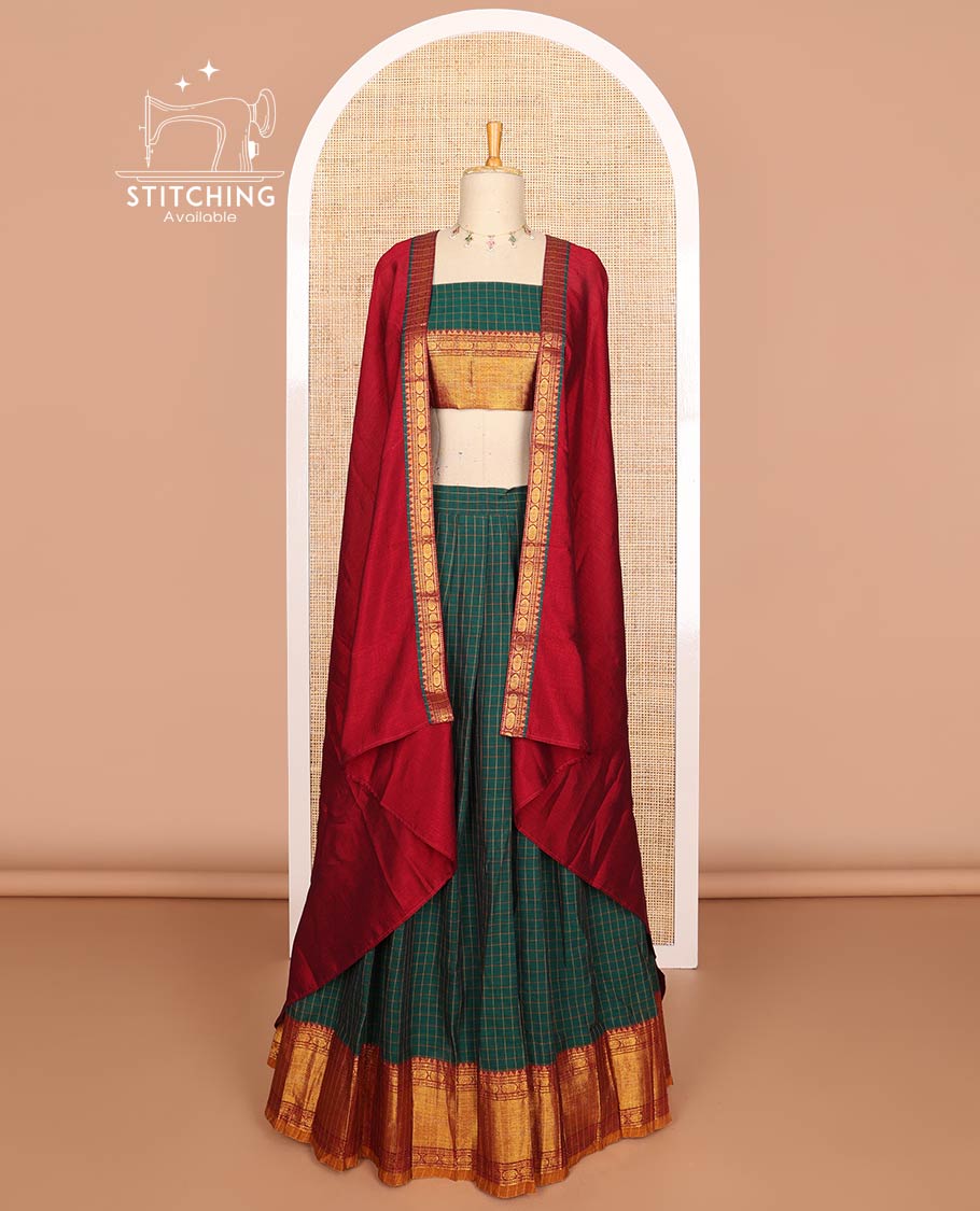 Dark green mercerised cotton daman zari border, checked design half saree with mercerised cotton checked blouse & skya georgette one side zari border work