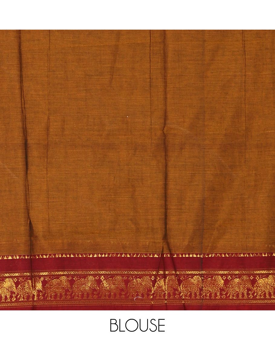 Mustard mercedised cotton half-saree, plain contrast elephant zari border skirt, matching blouse & contrast maroon zari elephant border dhavani