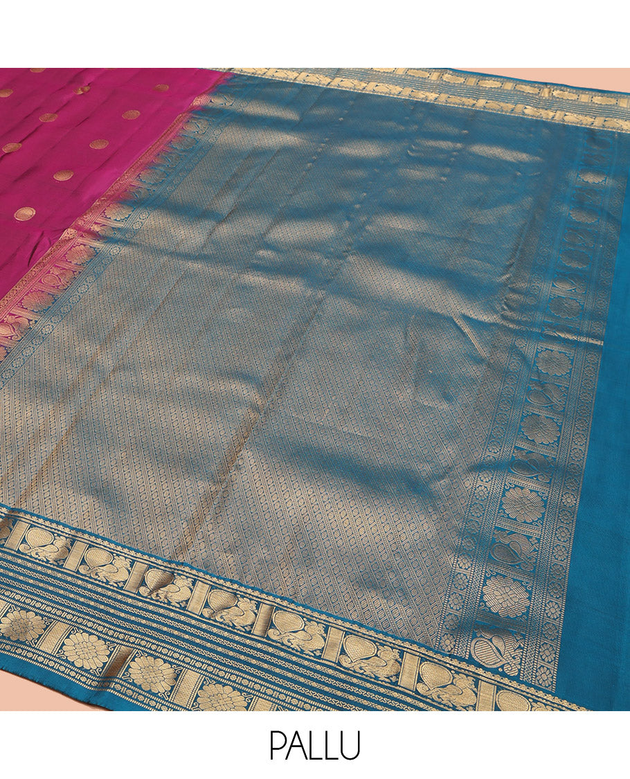 Purple Vasundhara Lite Silk Mix Saree, Embellished with Poun Buttas All Over Its Body, Complemented by a Contrast Border of Mayil, Cros Neli, Kamalam, and Chakram Designs, Elegantly Designed Pallu, and Paired with a Contrast Blouse