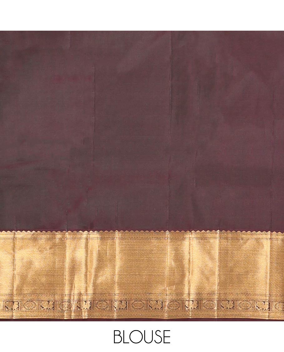 Brown Kanchipuram Wedding Silk Saree, Decked Up with Jacquard Design On Its Body, Highlighted by Zari Border of Rekku, Mayil and Chakram Designs, Grand Jaal Pallu and Paired with a Matching Blouse