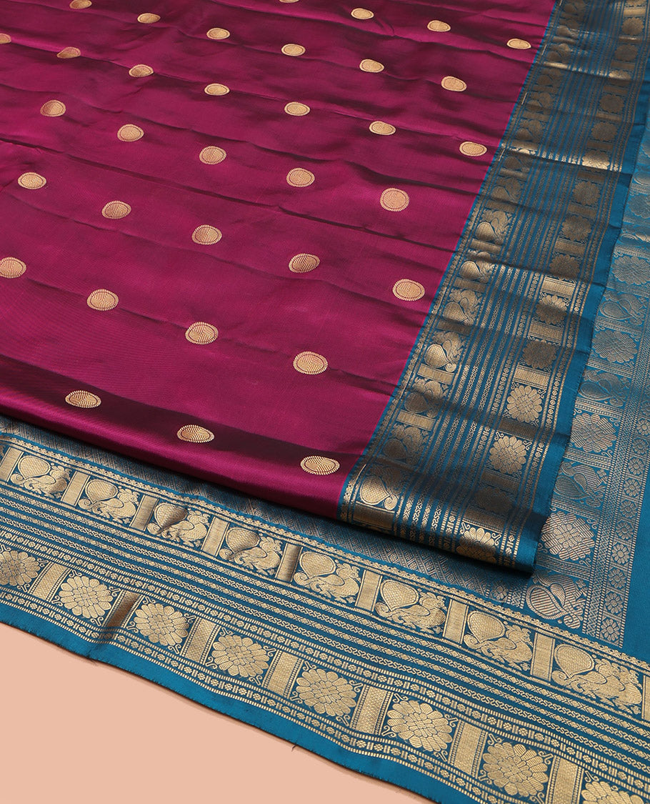 Purple Vasundhara Lite Silk Mix Saree, Embellished with Poun Buttas All Over Its Body, Complemented by a Contrast Border of Mayil, Cros Neli, Kamalam, and Chakram Designs, Elegantly Designed Pallu, and Paired with a Contrast Blouse