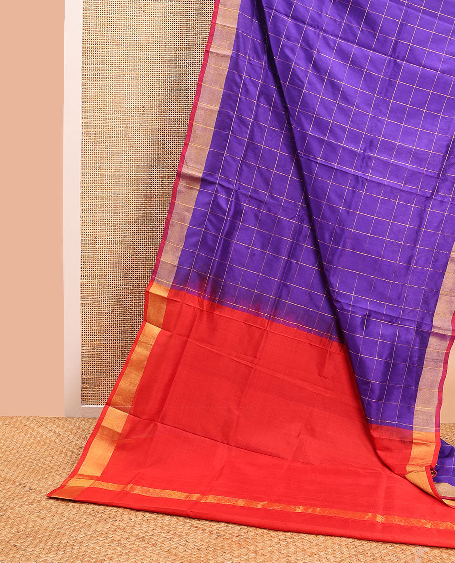 Blue checked uppada saree with contrast striped border & zari pallu