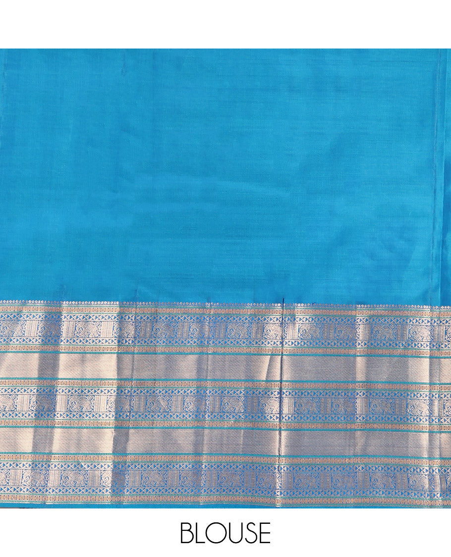 Blue Vasundhara Lite Silk Mix Saree Features Zari Buttas, a Zari Border of Kamalam, Ara Maadam, and Yaali, Pallu of Butta Enclosed Checks, and a Matching Blouse
