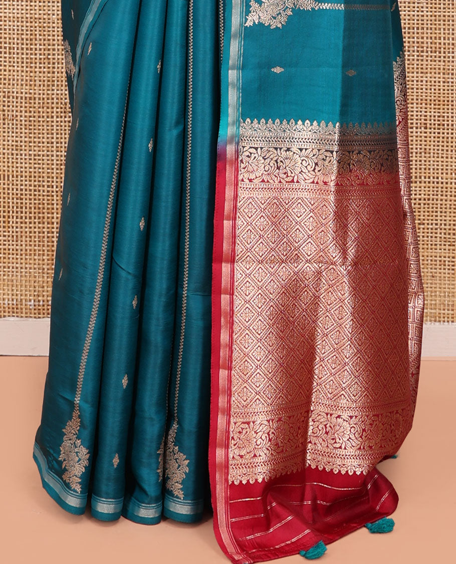 Peacock Blue Satin Silk Saree, Steeped in Richness of Floral Design All Over Its Body, a Subtle Zari Piping Border, Complemented by a Contrast Jaal Design Pallu, and Paired with a Contrast Blouse