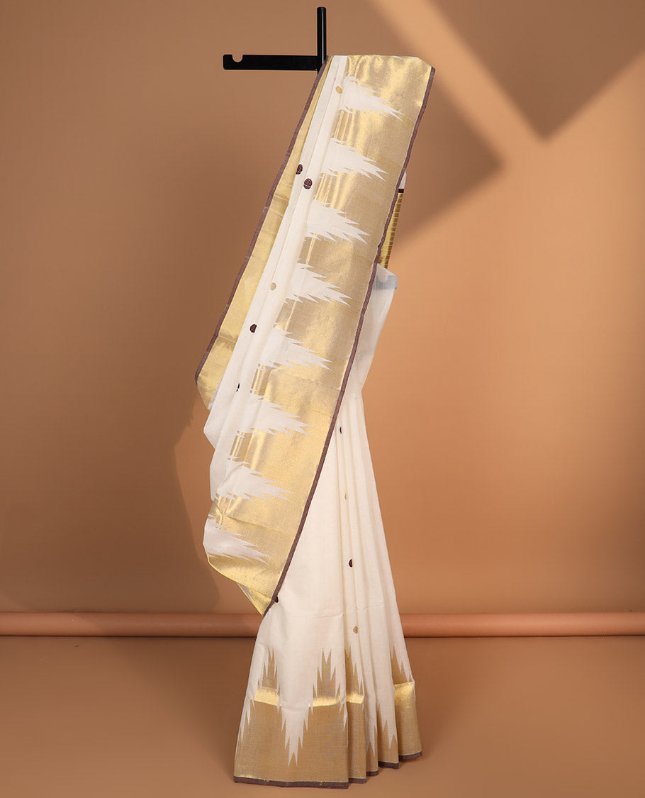 White polka dot kasavu saree with self temple border & striped pallu, brown border