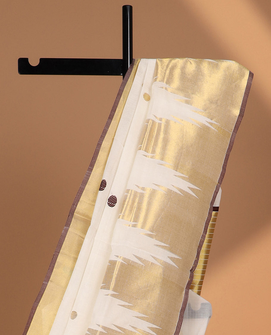 White polka dot kasavu saree with self temple border & striped pallu, brown border