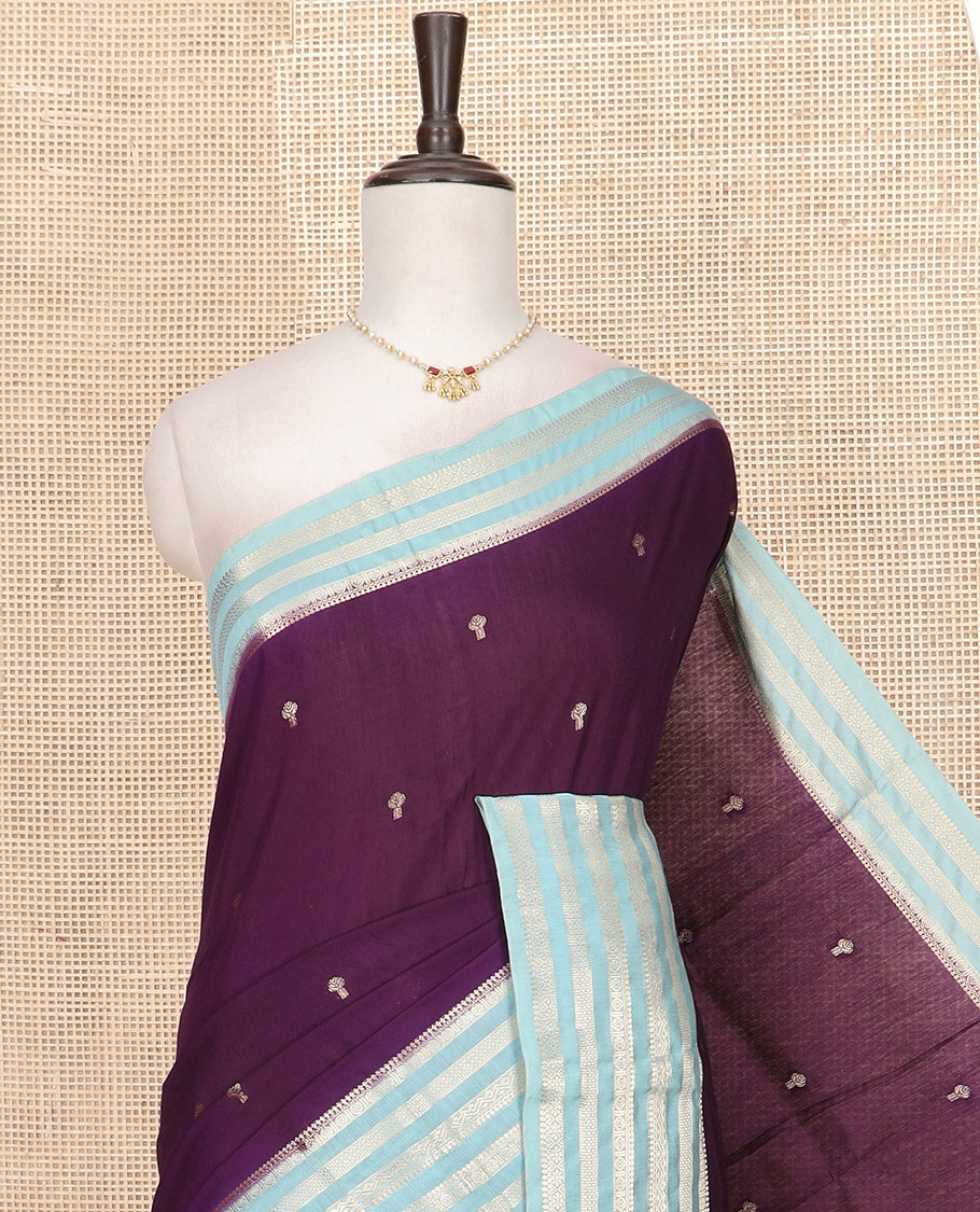 Purple Assam Silk Saree Prettified with Zari Buttas, Complemented by Contrast Zari Border Featuring Traditional Zari Designs, a Gleaming Pallu of Zari Stripes, and Paired with a Contrast Blouse