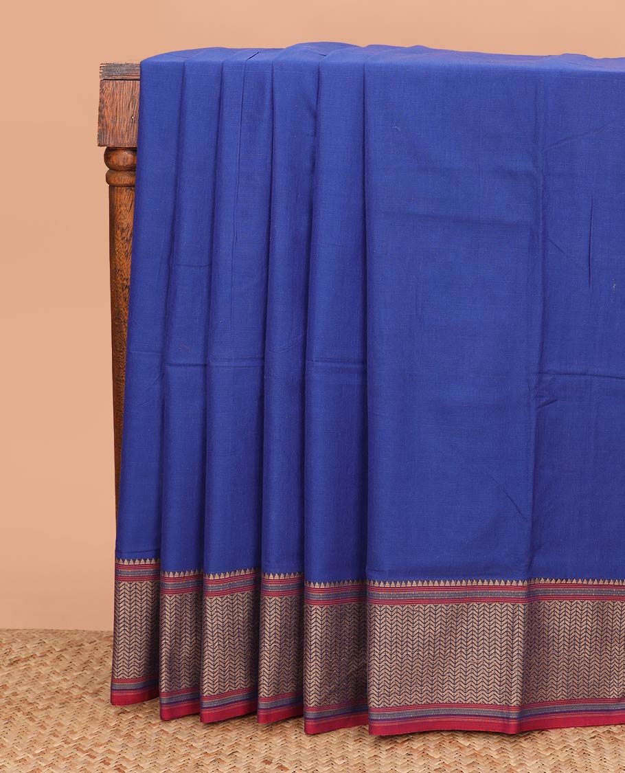 Royal blue plain Narayanpet cotton saree, contrast geometric design border, and striped pallu