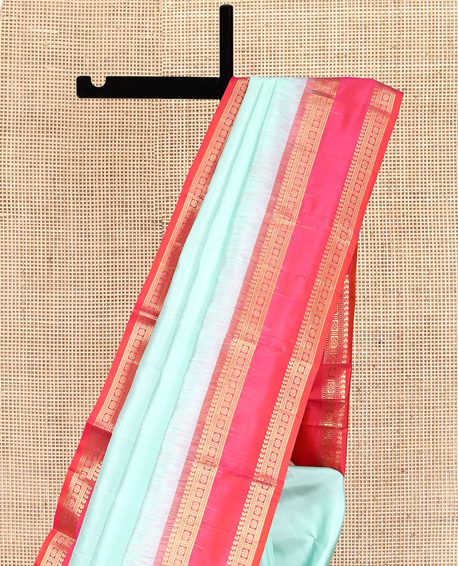 Light Turquoise Plain Kanchipuram Silk Saree, Complemented by a Contrast Rettai Pettu Border of Manga, Banaras, Muthu, and Kamalam, Vanki Pallu, and a Contrast Blouse