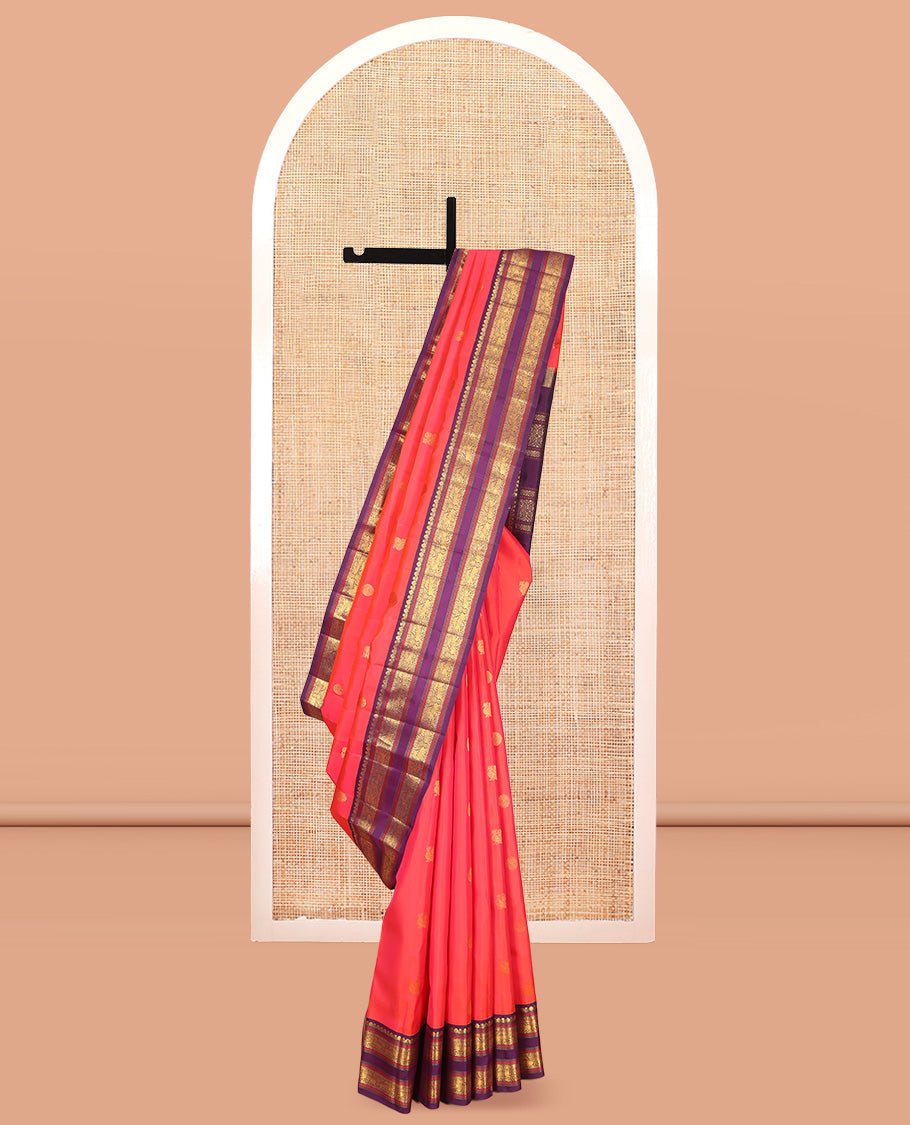 Orange Kanchipuram Silk Saree, Graced with Mayil-Chakram Buttas, a Contrast Korvai Rettai Pettu Border of Muthu, Muthu, and Kuthirai Designs, Traditional Pallu, and a Contrast Blouse