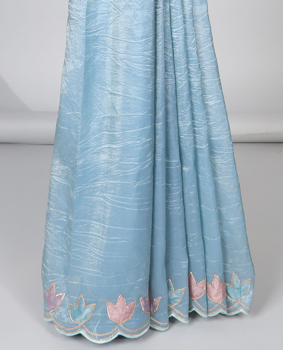 Light blue tissue saree with self scallop border & floral embroidery pallu