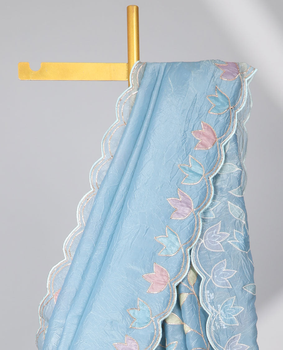Light blue tissue saree with self scallop border & floral embroidery pallu