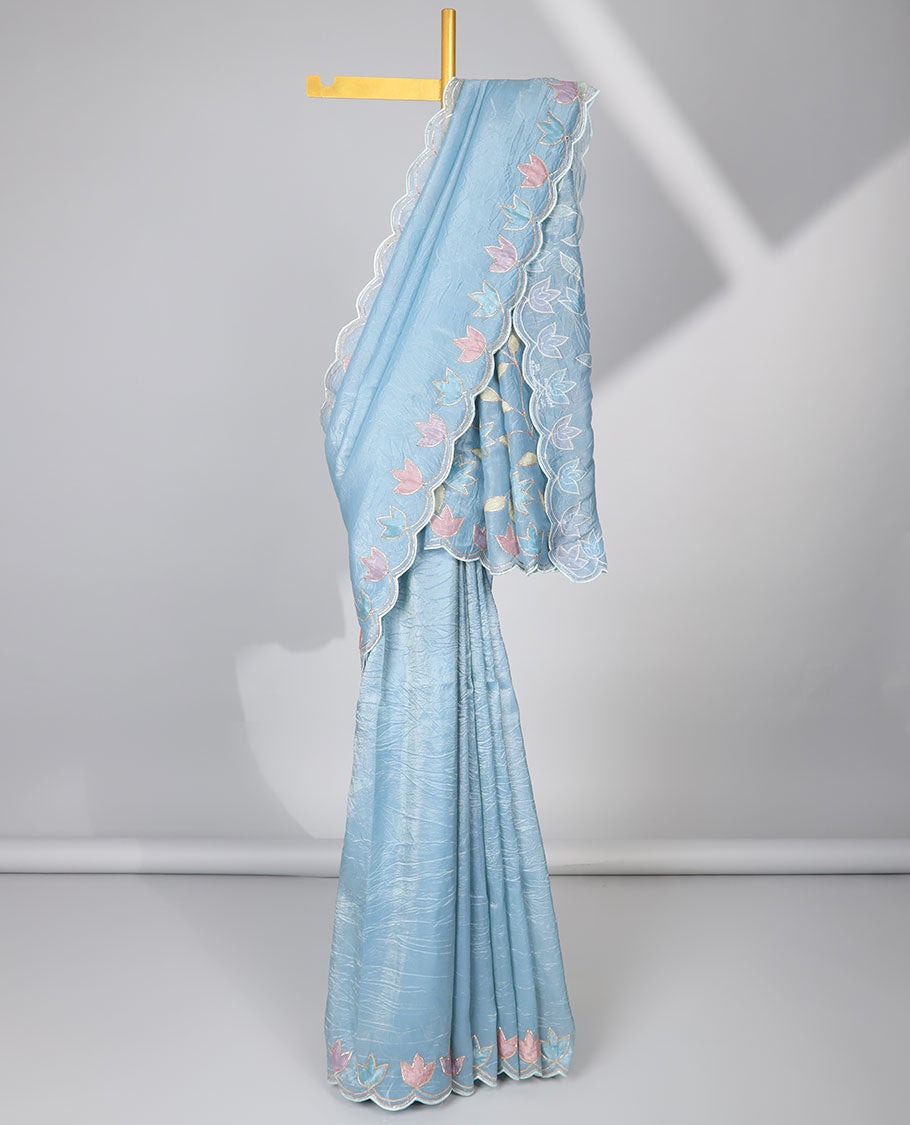 Light blue tissue saree with self scallop border & floral embroidery pallu
