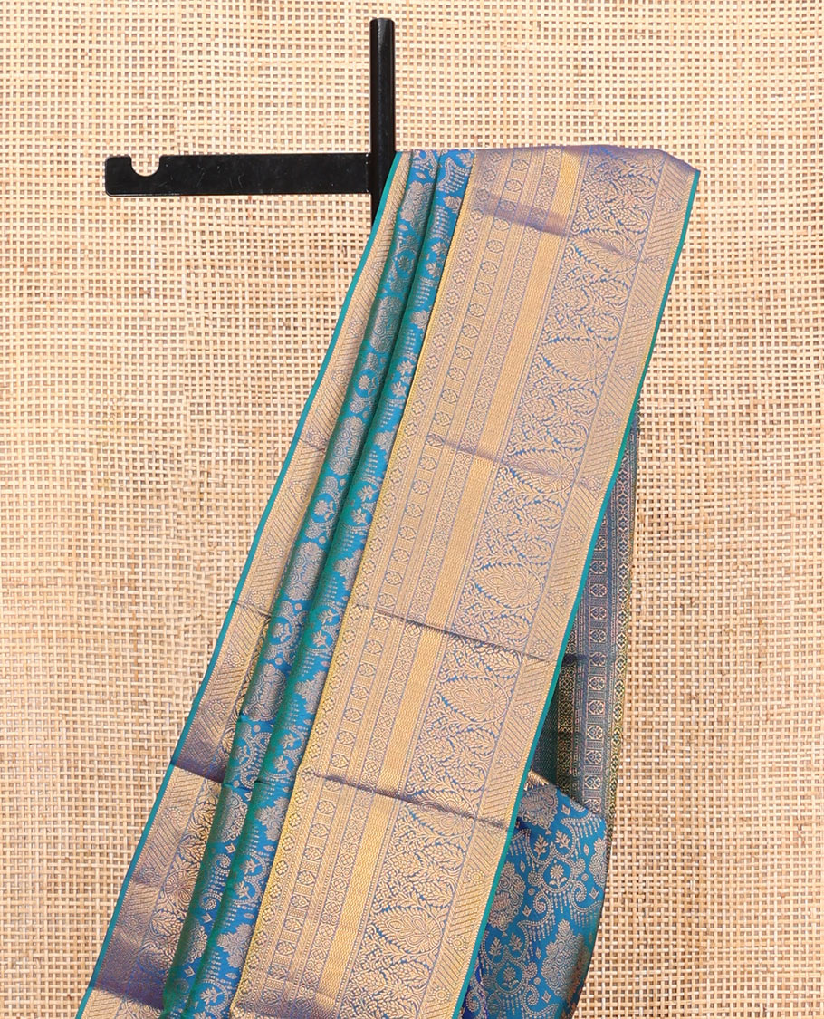 Blue Kanchipuram Wedding Silk Saree, Ornamented with Jacquard Design on Its Body, Highlighted by Zari Border of Rekku, Banaras, Cross Kamalam, Vanki, and Kodi Visiry Designs, Meticulously Crafted Pallu, and Paired with a Matching Blouse