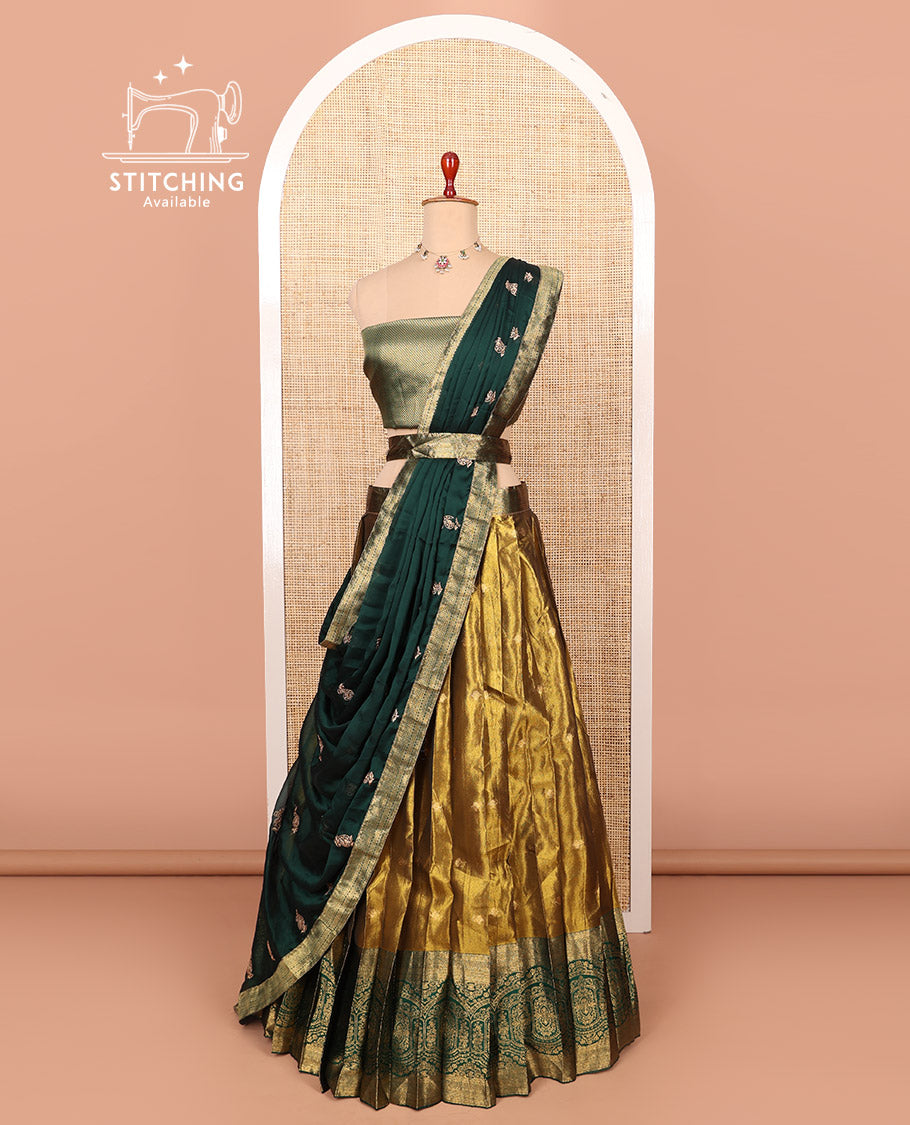 Gold-dark green zari buttas half-saree with contrast intricate Mughal motifs woven bordered skirt, brocade blouse, and a zari design dhavani