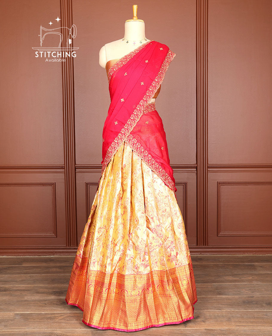 Orange floral jacquard half saree with contrast intricate zari design border, zari design blouse & floral embroidery scallop border dhavani