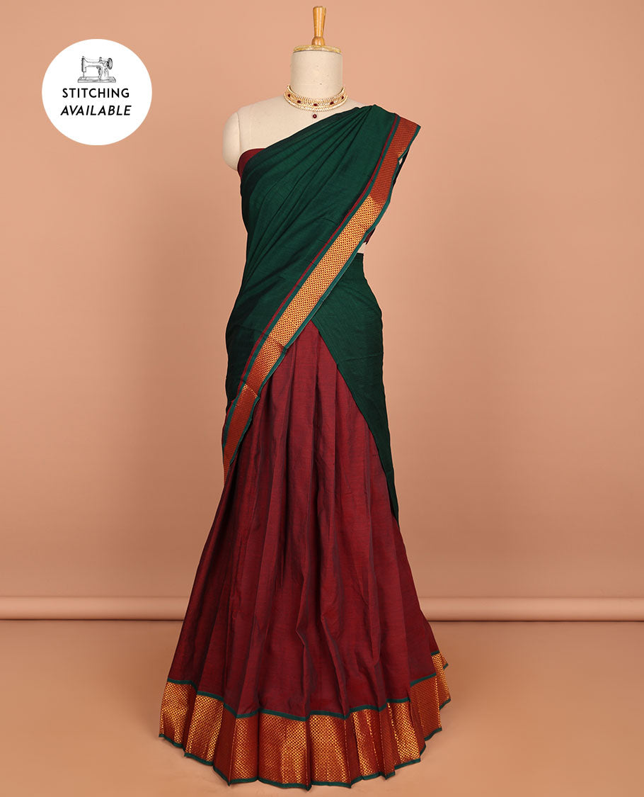 Pink cotton half saree with contrast traditional border , plain blouse & plain dhavani with zari design border