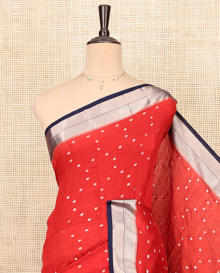Red Assam Silk Saree, Steeped with Zari Buttas, Complemented by a Contrast Traditional Zari Border, Zari Striped Pallu, and a Contrast Blouse