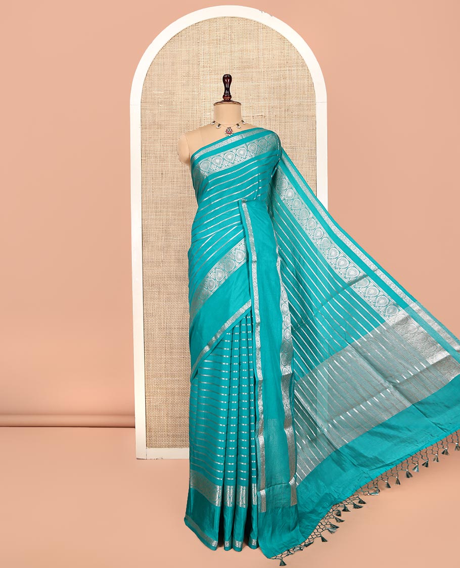 Green Assam Silk Saree, Opulently Embellished with Zari Stripes, Highlighted by a Traditional Zari Border, Zari Design Pallu, and a Matching Blouse