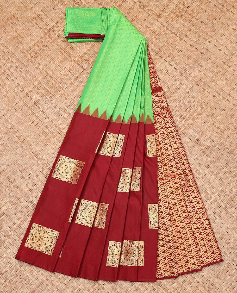 Borderless Red and Green Budget Silk Saree Features Embossed and Zari Buttas, Complemented by a Intricate Pallu, and Contrast Blouse