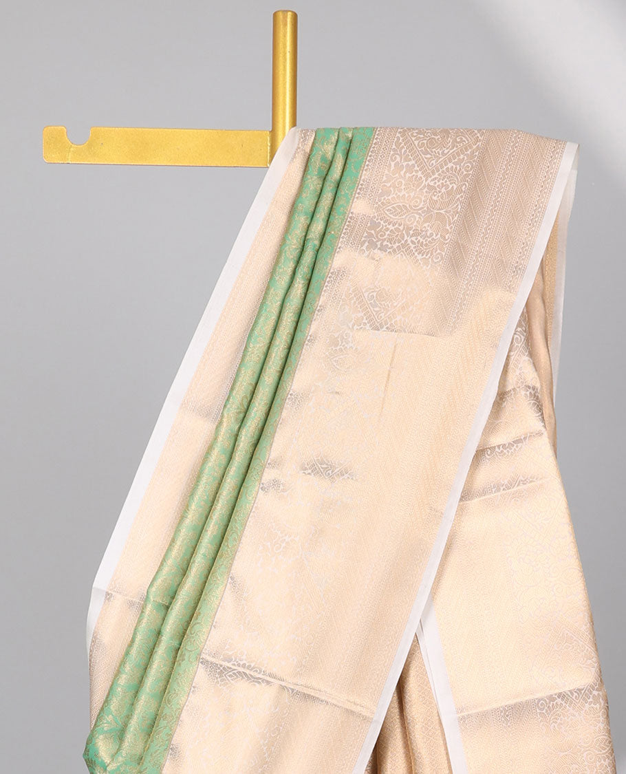 Green floral jacquard budget silk saree with contrast floral zari design border & intricate zari design pallu