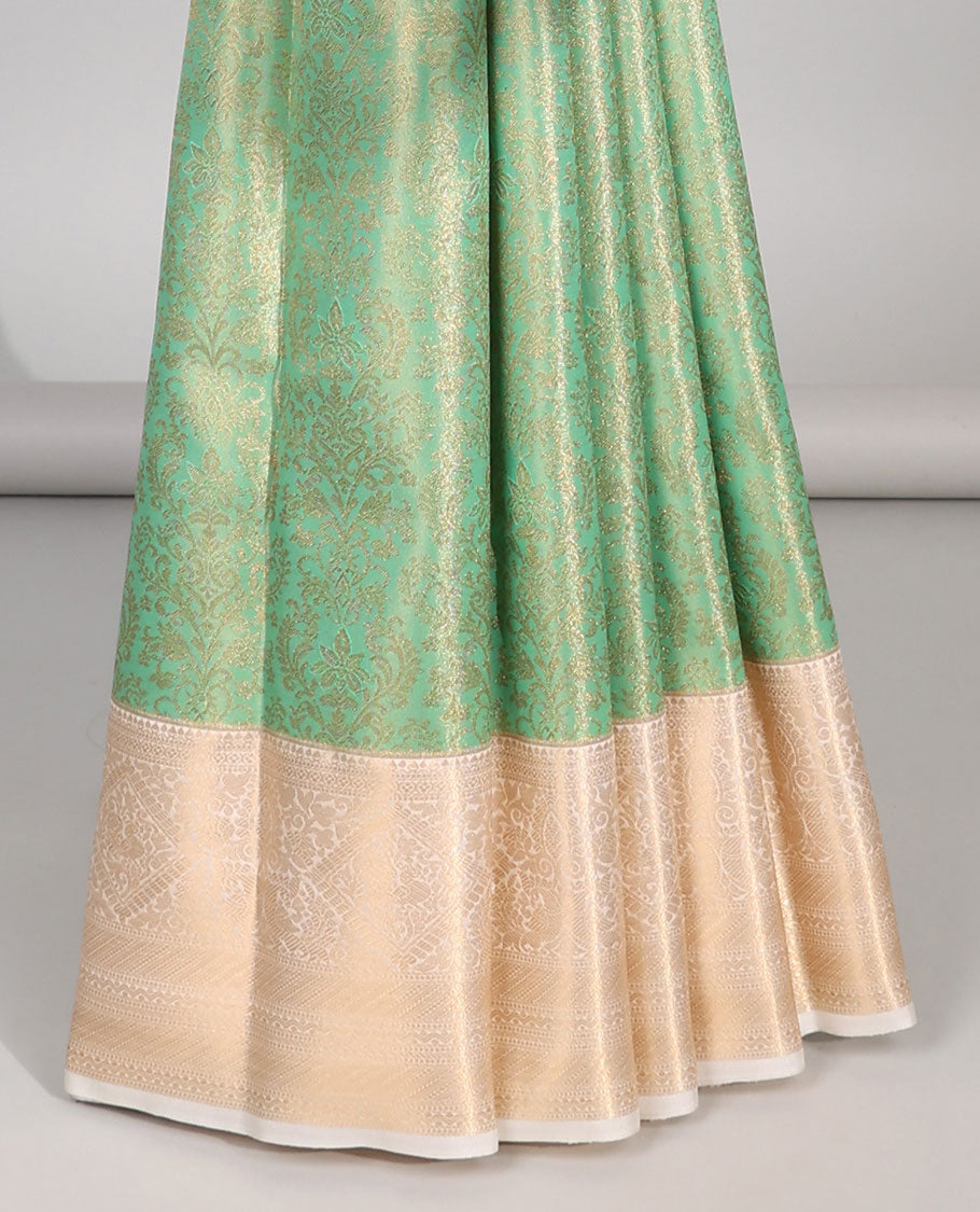 Green floral jacquard budget silk saree with contrast floral zari design border & intricate zari design pallu