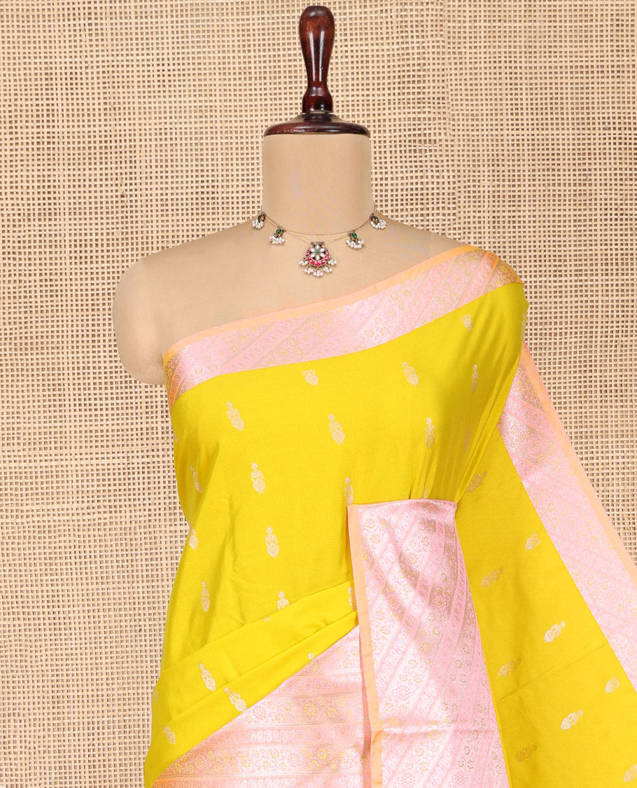 Yellow Budget Silk Saree, Sparsely Woven with Zari Buttas All Over Its Body, Complemented by Contrast Border of Floral-Paisley Designs, Beautifully Bedecked Pallu of Jaal Designs, and Paired with a Contrast Blouse
