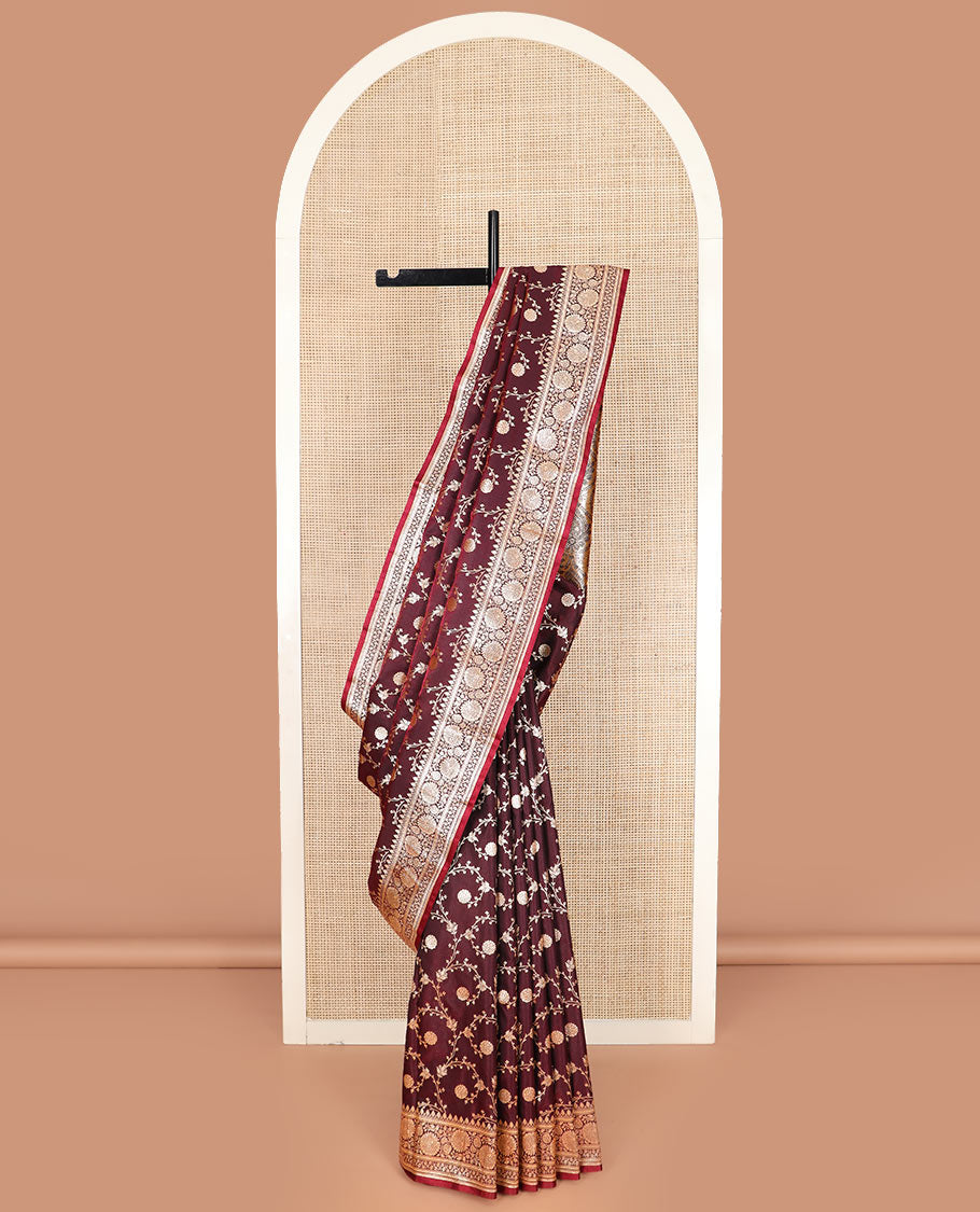 Maroon floral jaal jacquard banarasi silk saree, floral creeper design border, and ogee patterned pallu