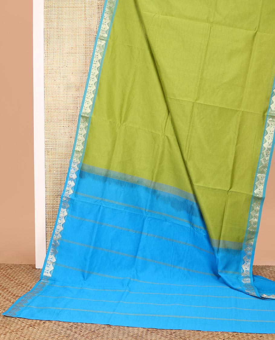Green Plain Poly Cotton Saree, Complemented by a Contrast Traditional Zari Border, Pallu of Stripes, and Paired with a Contrast Blouse