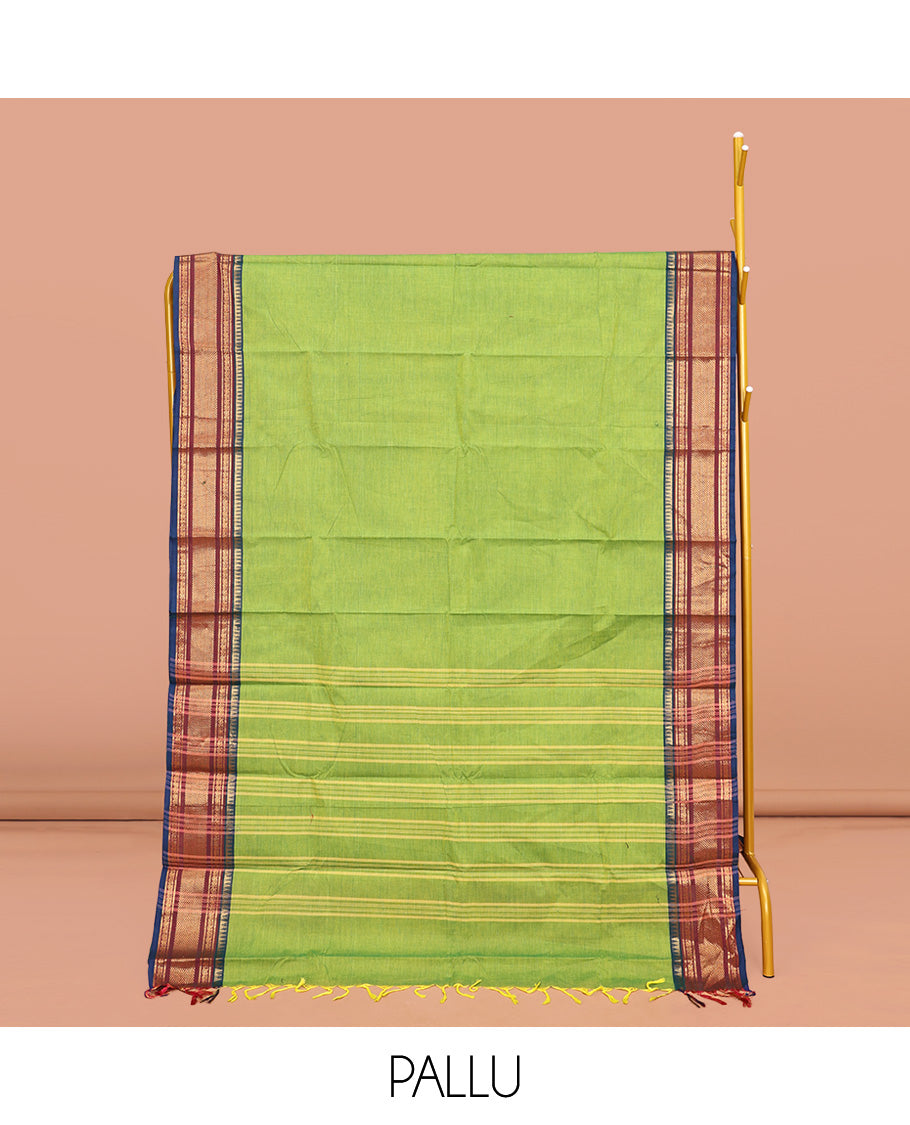 Leaf Green Plain Chettinad Cotton Saree, Complemented by Contrast Traditional Zari Design Border, Pallu of Stripes, and Paired with a Matching Blouse